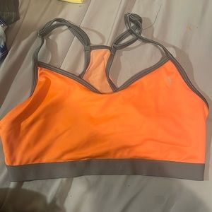 Orange and grey sports bra with mesh back size L